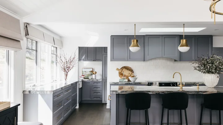 A grey blue kitchen inside a modern melbourne home.