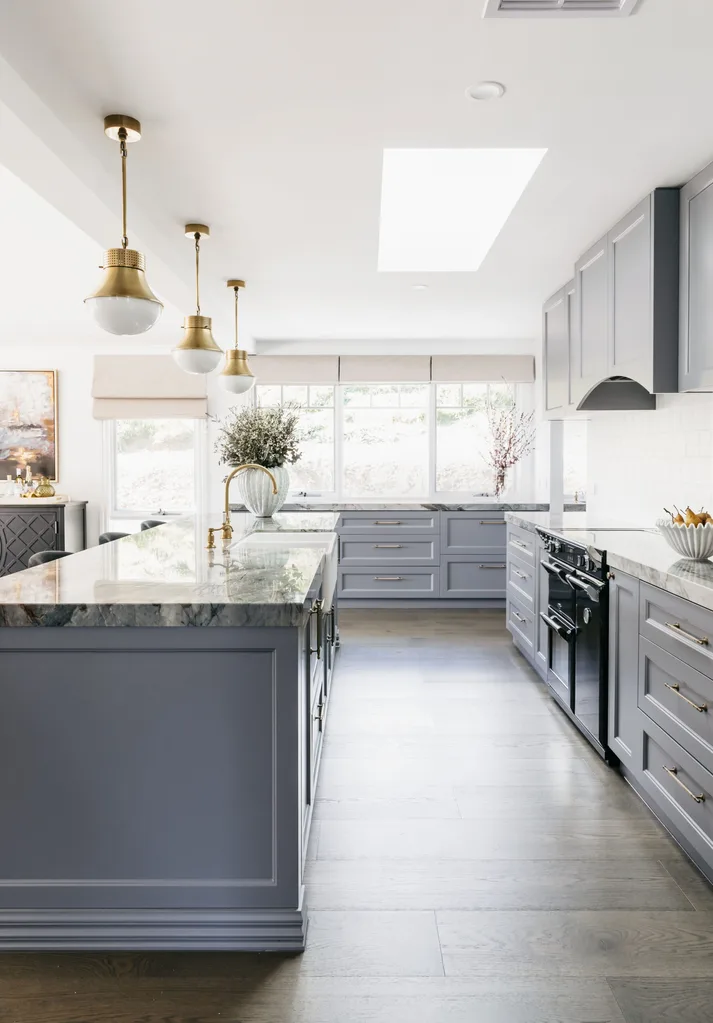 A blue grey kitchen inside a modern melbourne home. 