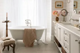 country style bathroom with clawfoot tub
