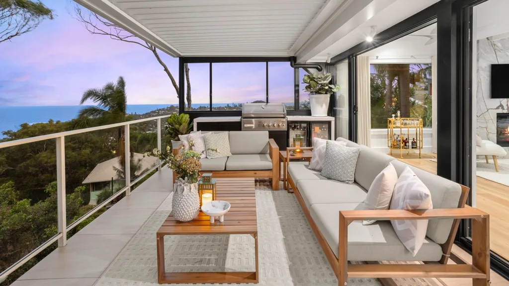 Mitch and mark from the block's newport house is for sale with a hamptons-style balcony and deck with an outdoor lounge and barbecue