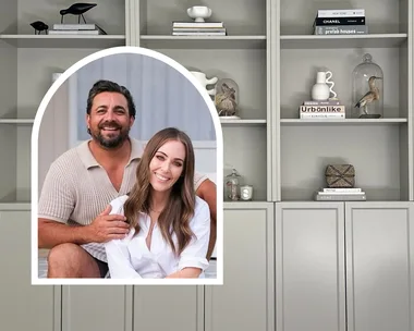 The completed custom-look cabinetry painted in a chic grey with products styled on and The Block couple Ronnie and Georgia smiling inset.