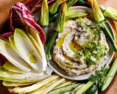 Whipped baba ganoush with Italian-style cruidtes including endives, zucchini flowers, radicchio Treviso and baby cucumbers